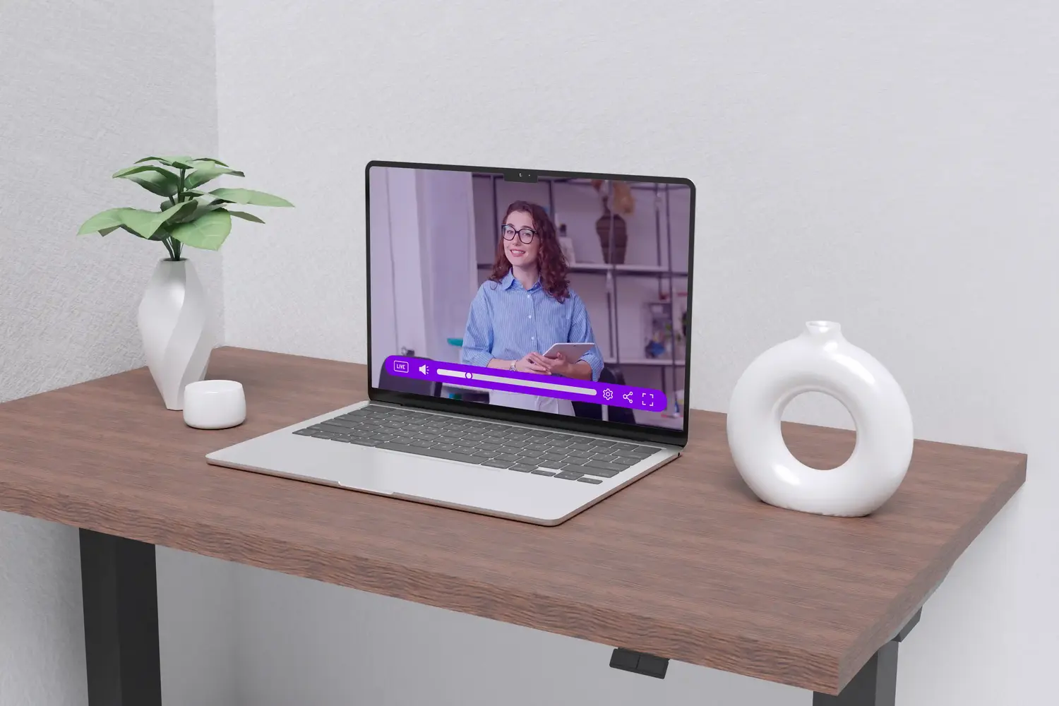 Cinema8 interactive video playing on a laptop, displaying a smiling woman presenting content, with the video controls visible, including the 'LIVE' label and playback options.